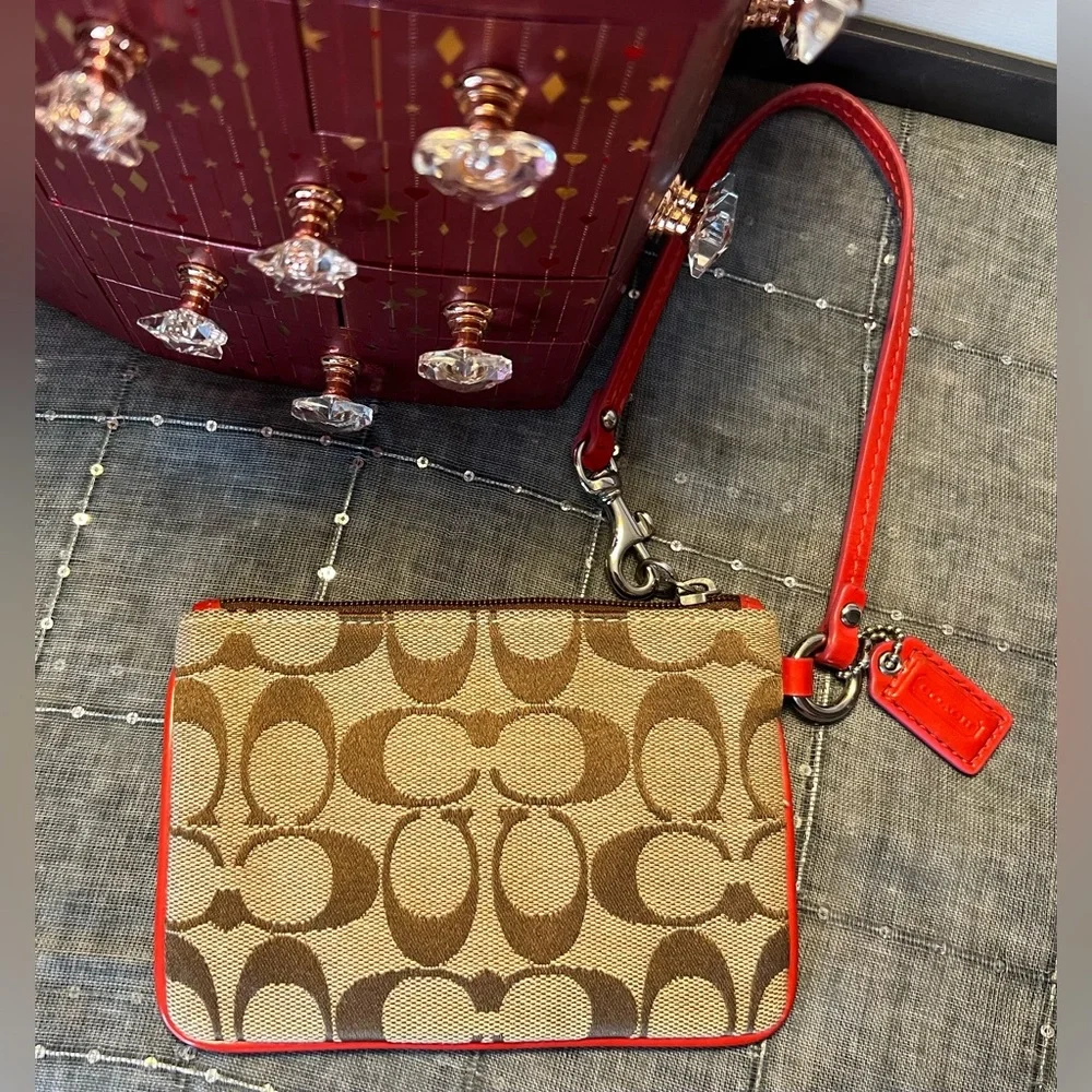 Coach Brown and Coral Wristlet with Signature C Monogram